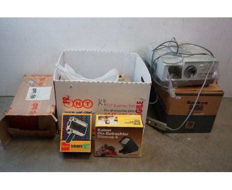 A quantity of photographic collectables to include a projector, slide viewer and a selection of cameras. 