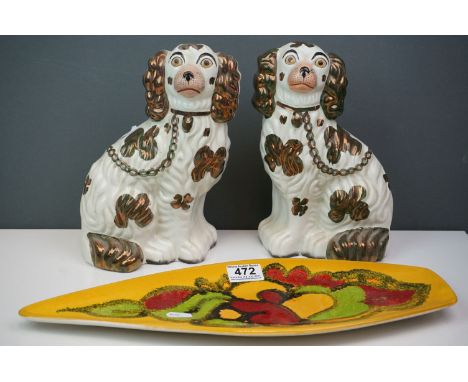 A 1970s Poole Pottery Delphis pattern dish together with a pair of lustre Staffordshire dogs. 