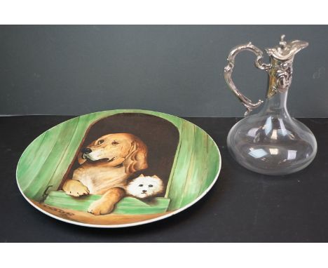 Early 20th century Bristol Ceramic Charger hand painted by Mary E Williams depicting to dogs in a kennel, 37cms diameter toge