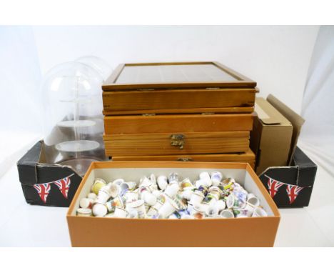 A very large collection of mainly ceramic thimbles to include William Morris, Paragon and The Thimbles Guild examples togethe