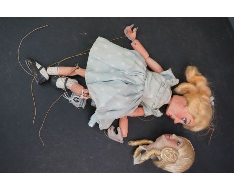 Wooden String Puppet in the form of a Girl in a Blue Dress together with Bisque Spanish dolls head 