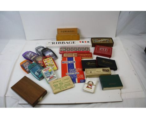 A collection of games to include cards, cribbage and dominoes. 