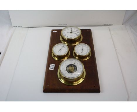 A group of four brass cased ships instruments to include clock and barometer. 
