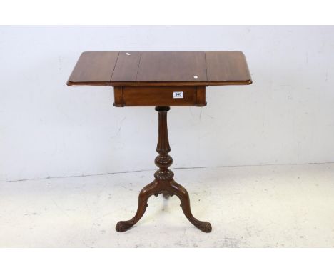 19th century Mahogany Lamp Table with drop- flaps, raised on a fluted pedestal base with three splay legs, 73cms high 