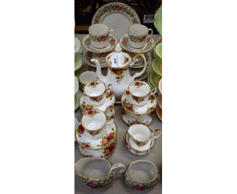 A Royal Albert Old Country Roses pattern coffee set for six, comprising coffee pot, cream jug, sugar bowl, cup and saucers; a