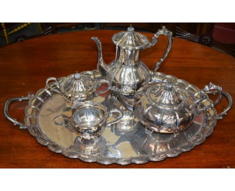 A Cavalier silver plated hand chased four piece tea service, comprising tea pot, coffee pot, cream jug and sucrier; a Mappin 