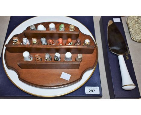 A Royal Worcester Capri pattern cake stand and slice, boxed; a set of fifteen Staffordshire hand painted Friends of the Fores