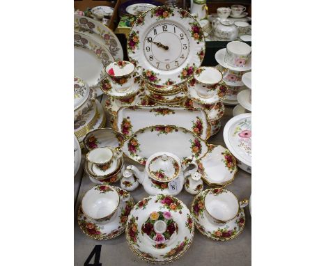 A Royal Albert Old Country Roses pattern tea ware, including teapot, milk jug, sugar bowls, dinner and side plates, cups and 