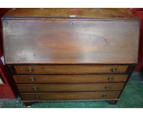An Edwardian mahogany bureau, crossbanded fall front centrally inlaid with a vacant oval enclosing a writing surface, small d