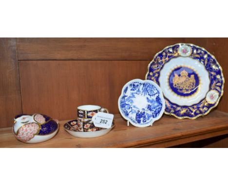 A Royal Crown Derby paperweight, Quail, gold stopper; a Royal Crown Derby 2451 pattern Imari coffee can and saucer; a Mikado 