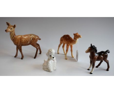 A Beswick camel calf; others, similar, a doe, deer and foal; a Goebel poodle (4)