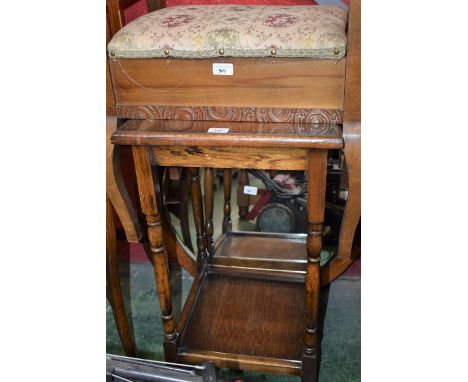 An early 20th century oak side table, square top above a conforming undertier; a circular oak framed mirror; a piano stool (3