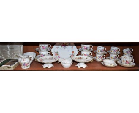 A Royal Crown Derby Posies pattern part tea and coffee service, including tea and coffee cups and saucers, side plates, bread