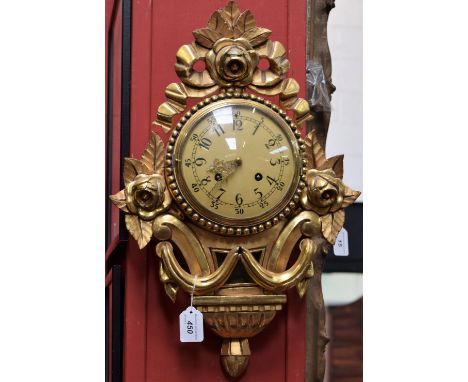 A Louis XV style cartel wall clock, 51cm high