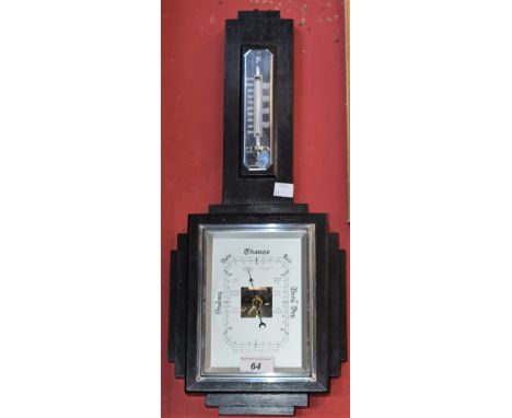 An Art Deco style ebonised aneroid barometer, 50cm high