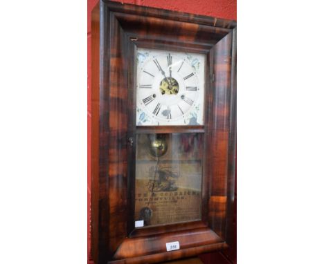 An American Smith &amp; Goodrich wall clock, Forestville, Bristol, Conneticut, painted white dial, Roman numerals, 66cm