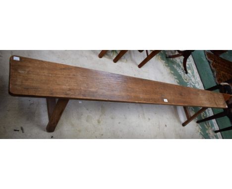 An oak farmhouse bench, 209cm wide