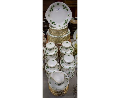 A Colclough Ivy Leaf pattern part dinner and tea service, comprising dinner plates, side plates, salad plates, bowls, cups, s