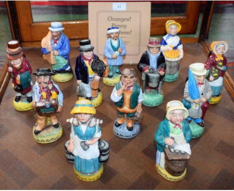 A set of twelve Franklin Mint ceramic Toby jugs, The Cries of London, designed by Peter Jackson, including Cures for all Ills
