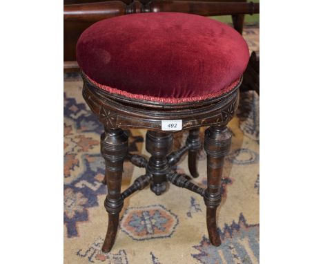 A 19th century adjustable piano stool, c.1875