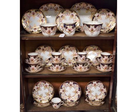 A Royal Crown Derby Imari palette part tea set, pattern 3788, comprising a pair of sandwich plates, milk jug, sugar and slop 