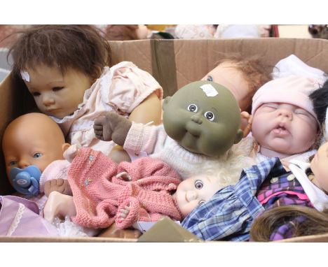 A quantity of collectors dolls; to include a ges gesch dated 1978 with pink eyes, NN Gotz, cabbage patch, ADG lifelike baby d