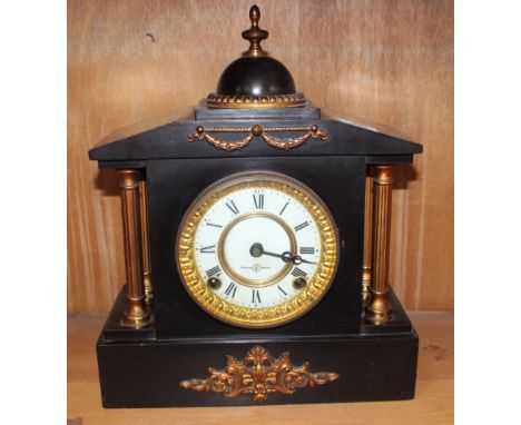 A black slate mantel clock with gilt decoration 