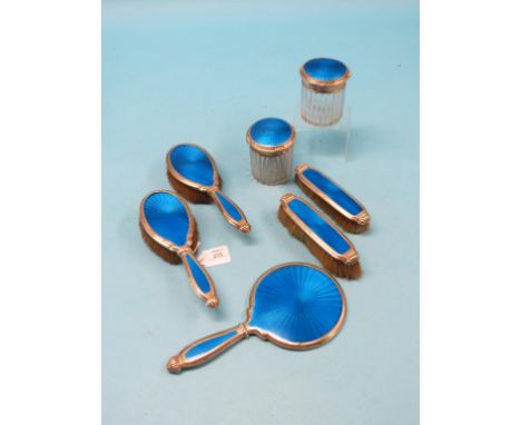 A silver and blue enamel dressing table set, Wilson & Gill, Birmingham 1923, seven pieces