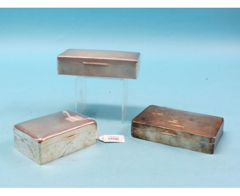 Three engine-turned silver cigarette boxes