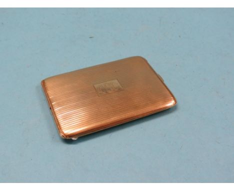 An engine-turned 14ct. gold cigarette case, 129 grams