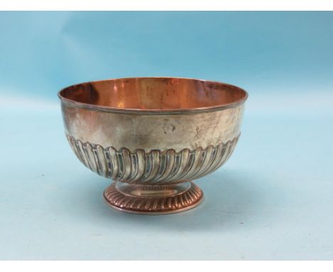 A large silver bowl, embossed wrythen pattern, Edward Hutton for Percy Edwards, Piccadilly, London 1892, approx. 30oz.