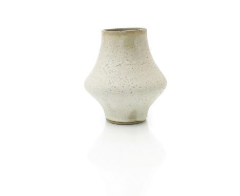 ‡ Dame Lucie Rie DBE (1902-1995) and Hans Coper (1920-1981) a stoneware vase, swollen cylindrical form, covered in an creamy 