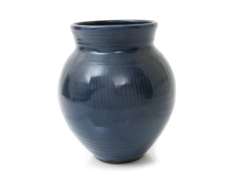 ‡ Michael Cardew (1901-1983) an earthenware vase, shouldered ovoid form with everted top rim, painted with black banded decor