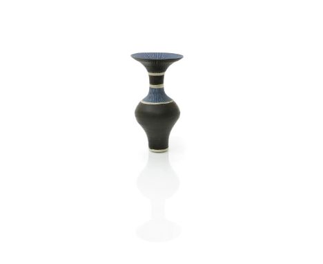 ‡ Dame Lucie Rie DBE (1902-1995) a fine porcelain bottle vase with flaring rim, covered with manganese and blue bands, incise