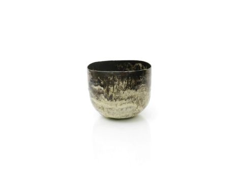 ‡ Dame Lucie Rie DBE (1902-1995) an early earthenware vase, circa 1936, elliptical form, running cream and brown glaze with s