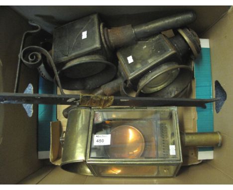 Pair of carriage lamps together with a wrought iron wall bracket together with another brass and copper lamp.