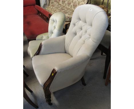 Late 19th/early 20th Century button back show frame fireside chair together with another similar button back nursing chair. (