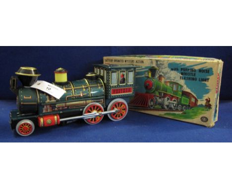 Japanese tin plate, battery operated Mystery Action Western Special Locomotive in original box with puffing noise, whistle an