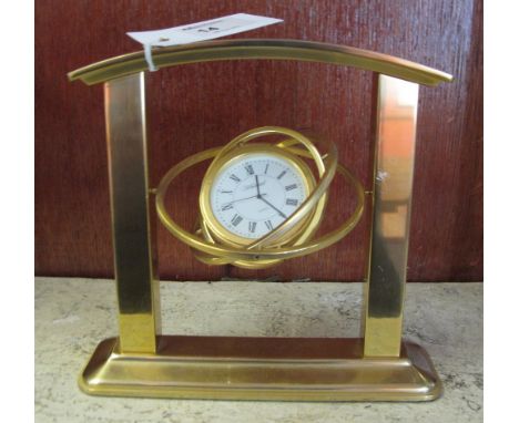 A Whitehall brass framed novelty celestial mantel clock with quartz movement.