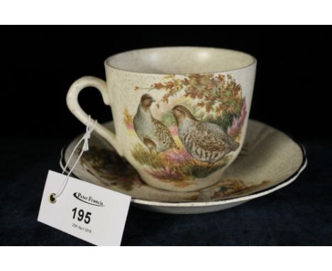 Palissy (Royal Worcester Group) china breakfast cup and saucer, transfer printed with vignettes of game birds.