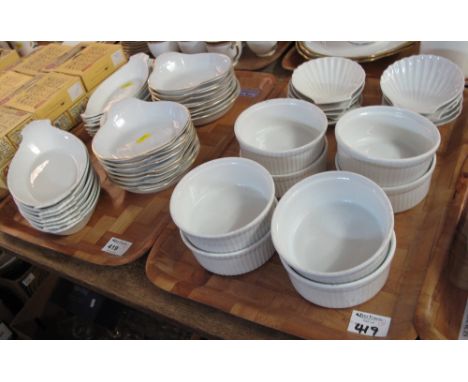 Two trays of china to include: Royal Worcester oven to tableware dishes together with French porcelain shell shaped dishes an