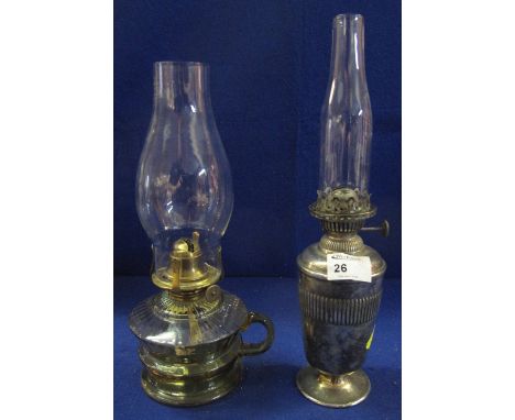 Mappin and Webb silver plated single burner, urn shaped oil lamp with fluted band and clear glass chimney together with a gre