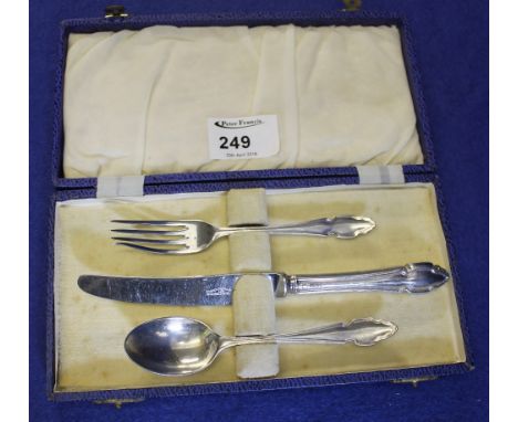 Cased silver Christening set comprising: spoon; knife and fork.
