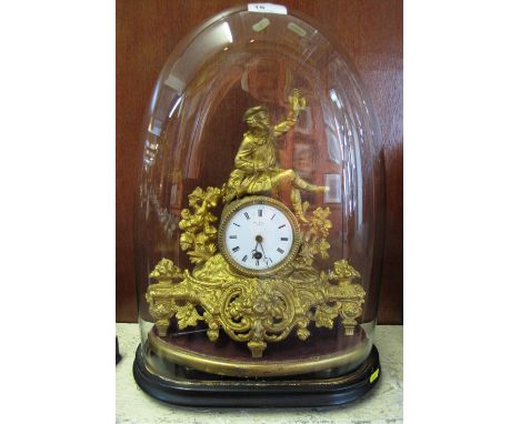 19th Century French gilded Spelter figural mantel clock with white enamel face having Roman numerals marked: H. Marc, Paris, 