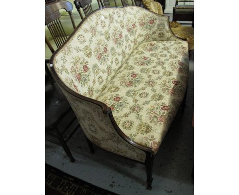 Edwardian mahogany florally upholstered parlour settee or sofa on square tapering, fluted legs and casters.