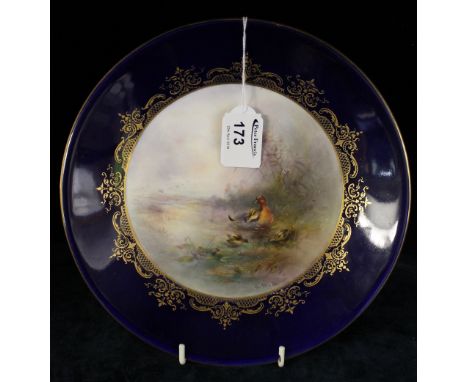 Royal Worcester cabinet plate, hand painted with ducks in landscape, signed J. Stinton, within gilt and cobalt blue border, p