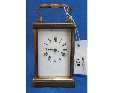 Small French brass carriage clock in plain gorge case with full depth enamel dial marked: Sir John Bennett Ltd. Paris.  With 