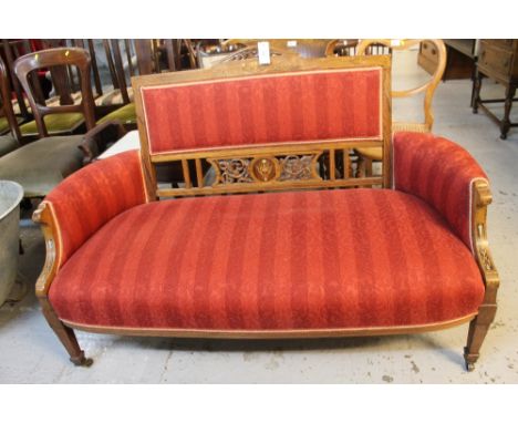 Late Victorian inlaid rosewood two seater upholstered sofa with pierced and carved panels, foliate decoration, standing on sq