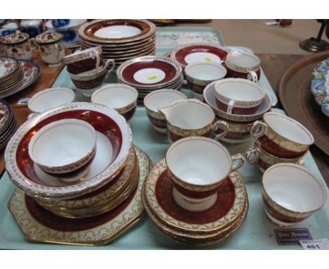 Two trays of Royal Stafford bone china, gilt and burgundy design tea and dinnerware items to include: tea cups and saucers; b