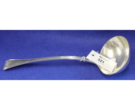 Large silver ladle with armorial stag's head device, London hallmarks.